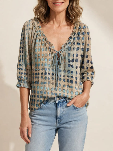 Lena | Blouse met stippenpatroon en vetersluiting