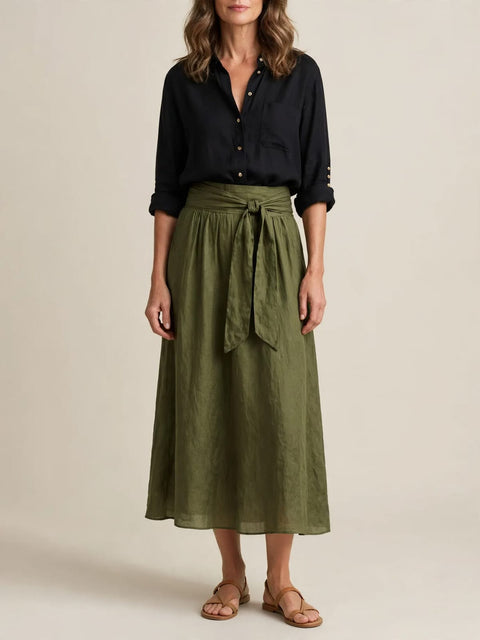 Vera | Tweedelige set met zwarte blouse en olijfgroene midi-rok